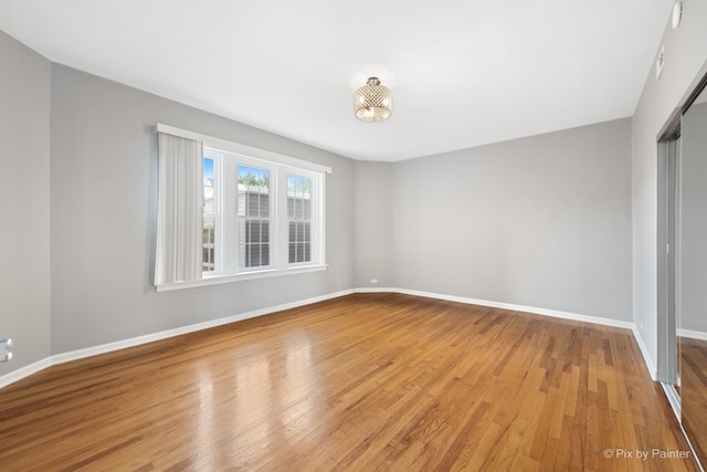 4321 N Drake Ave Unit 3W, Chicago, IL 60618 - empty room with light wood-type flooring and baseboards