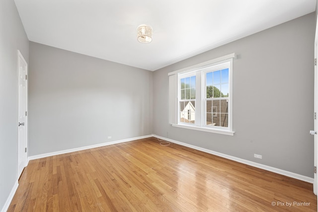 4321 N Drake Ave Unit 3W, Chicago, IL 60618 - unfurnished room featuring light wood-style floors