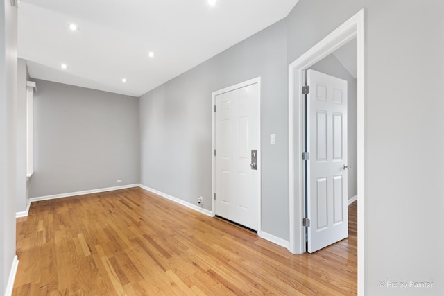 4321 N Drake Ave Unit 3W, Chicago, IL 60618 - empty room featuring light wood finished floors and recessed lighting