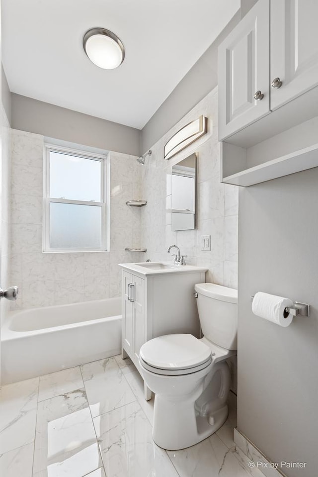 4321 N Drake Ave Unit 3W, Chicago, IL 60618 - bathroom featuring vanity, bathtub / shower combination, and marble finish floors