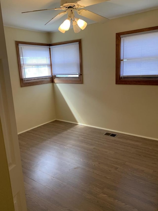 2605 Park St, Rolling Meadows, IL 60008 - spare room with wood finished floors and a ceiling fan