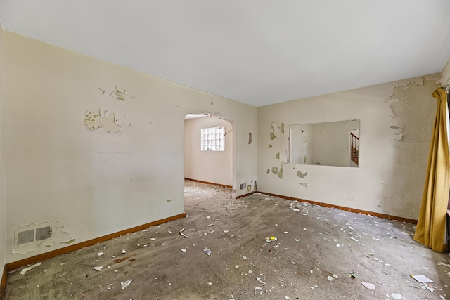 3713 S 57th Ct, Cicero, IL 60804 - empty room featuring arched walkways and baseboards