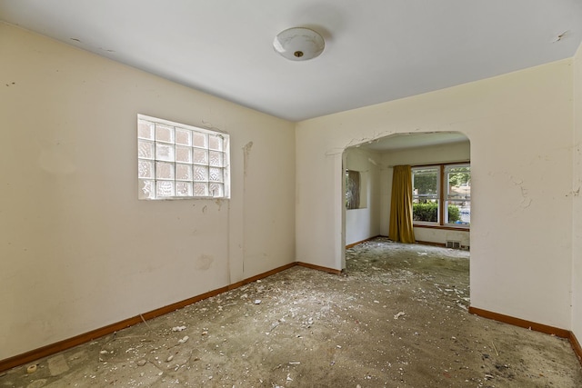 3713 S 57th Ct, Cicero, IL 60804 - unfurnished room with arched walkways and baseboards