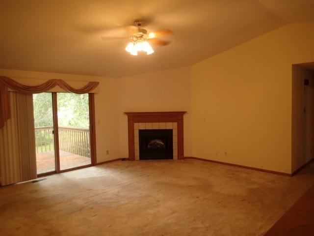 3430 Treadway Ct, Rockford, IL 61103 - unfurnished living room with ceiling fan, a tile fireplace, light colored carpet, and lofted ceiling