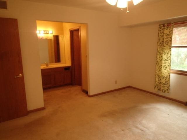 3430 Treadway Ct, Rockford, IL 61103 - unfurnished room featuring ceiling fan and light colored carpet