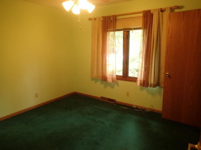 3430 Treadway Ct, Rockford, IL 61103 - unfurnished room with a ceiling fan and carpet