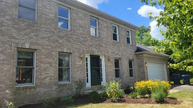 630 Maple Ct, Elburn, IL 60119 - view of front of home with a garage and brick siding