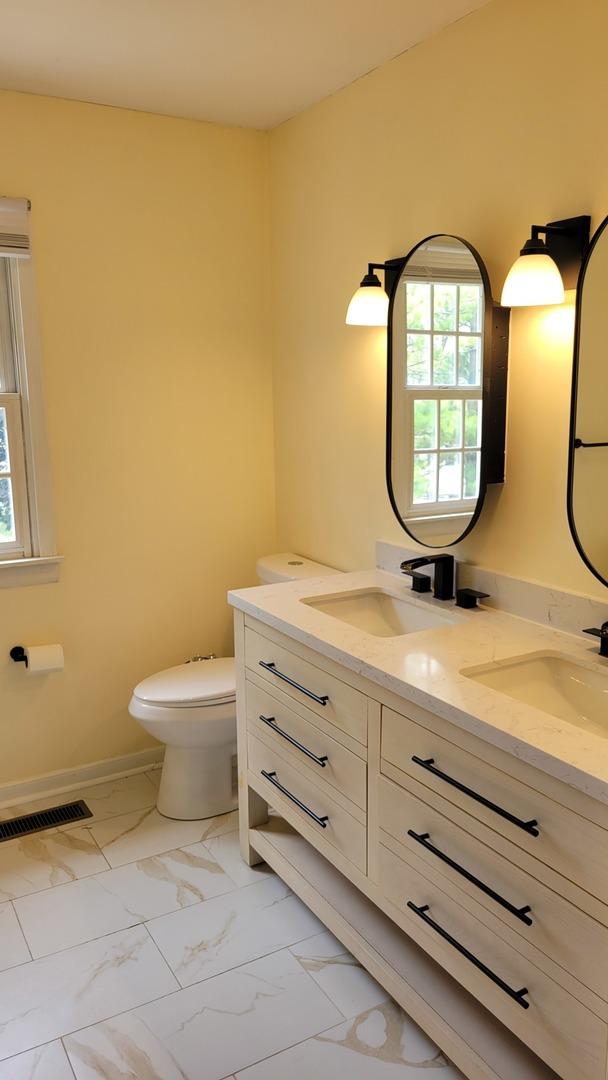 630 Maple Ct, Elburn, IL 60119 - bathroom featuring double vanity and marble finish flooring