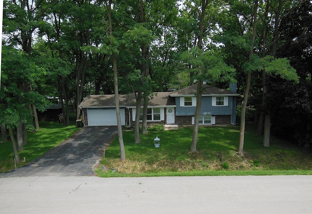 29W324 Grove Ave, West Chicago, IL 60185 - split level home with driveway, a garage, and a front yard