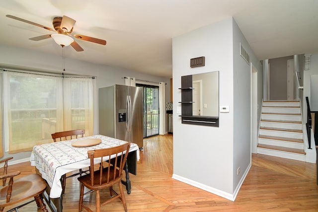 29W324 Grove Ave, West Chicago, IL 60185 - dining area with a ceiling fan, stairs, and light wood-type flooring