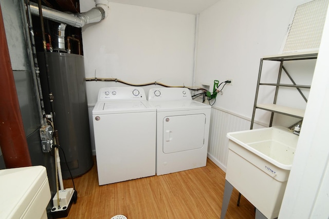 29W324 Grove Ave, West Chicago, IL 60185 - laundry area featuring water heater, washer and dryer, and light wood-style flooring