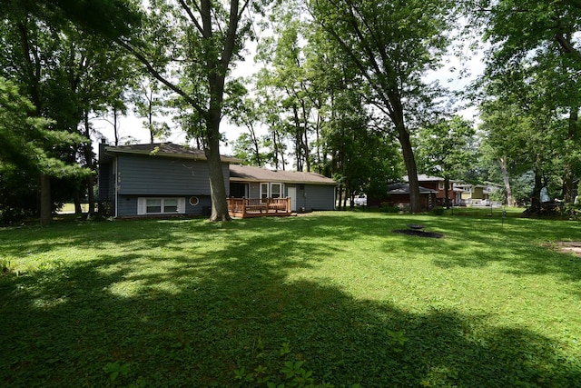 29W324 Grove Ave, West Chicago, IL 60185 - back of house with a wooden deck and a yard