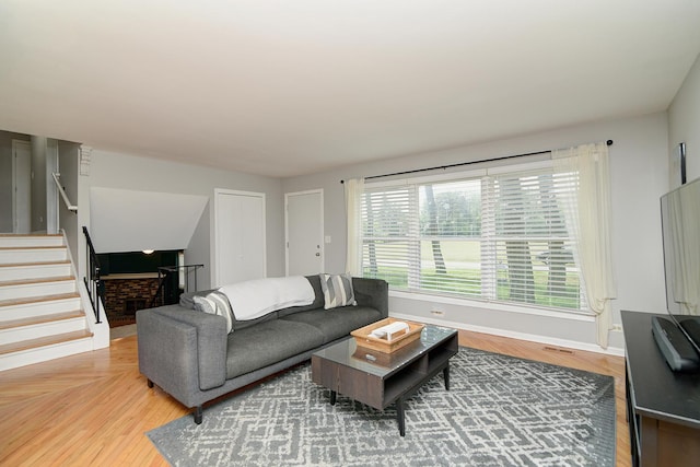 29W324 Grove Ave, West Chicago, IL 60185 - living room featuring stairway and light wood finished floors