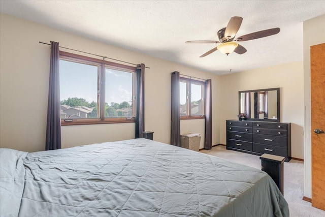 141 Manor Cir, Bloomington, IL 61704 - bedroom featuring light colored carpet and ceiling fan