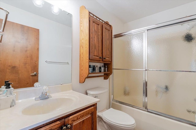 141 Manor Cir, Bloomington, IL 61704 - bathroom featuring vanity and bath / shower combo with glass door