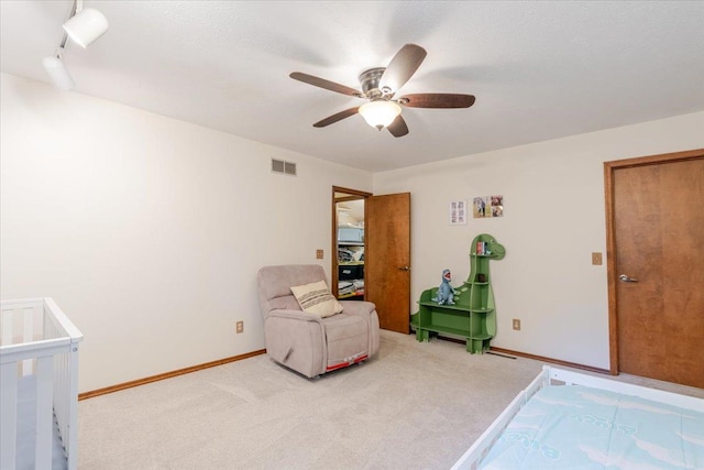 141 Manor Cir, Bloomington, IL 61704 - carpeted bedroom featuring baseboards and a ceiling fan