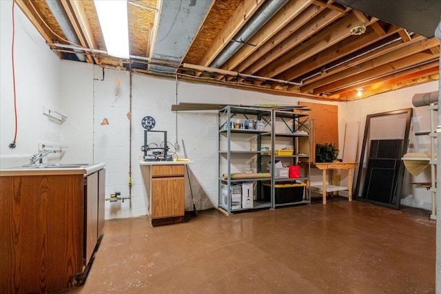 141 Manor Cir, Bloomington, IL 61704 - unfinished basement featuring a sink and concrete block wall