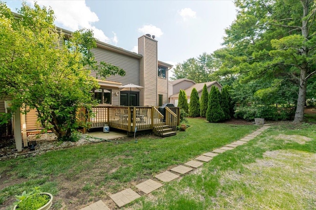 141 Manor Cir, Bloomington, IL 61704 - view of grassy yard with a wooden deck