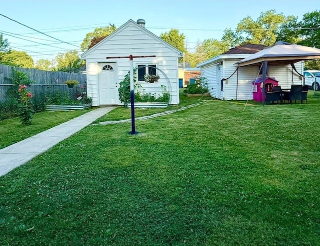 1217 S 7th Ave, Kankakee, IL 60901 - view of yard with a gazebo and an outdoor structure
