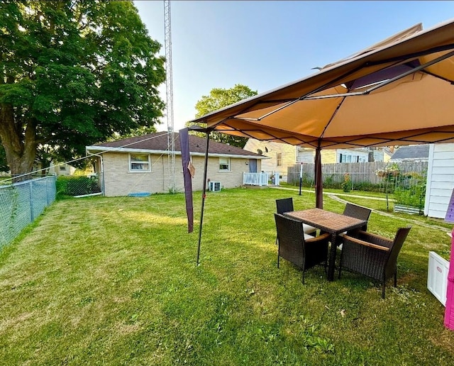 1217 S 7th Ave, Kankakee, IL 60901 - fenced backyard with a gazebo