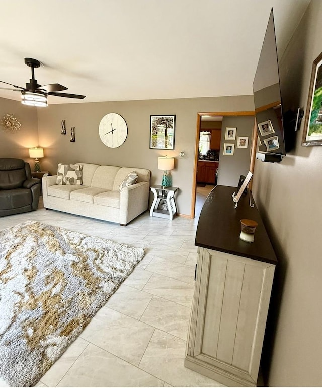 1217 S 7th Ave, Kankakee, IL 60901 - living area with a ceiling fan and light marble finish floors