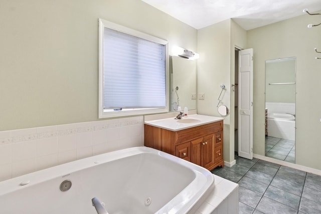 1405 1st Ave, Sterling, IL 61081 - full bathroom with a tub with jets, vanity, and tile patterned flooring
