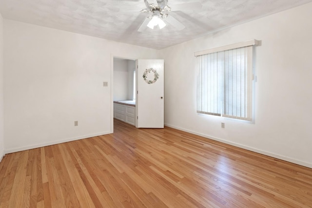 1405 1st Ave, Sterling, IL 61081 - empty room featuring light wood-type flooring and a ceiling fan