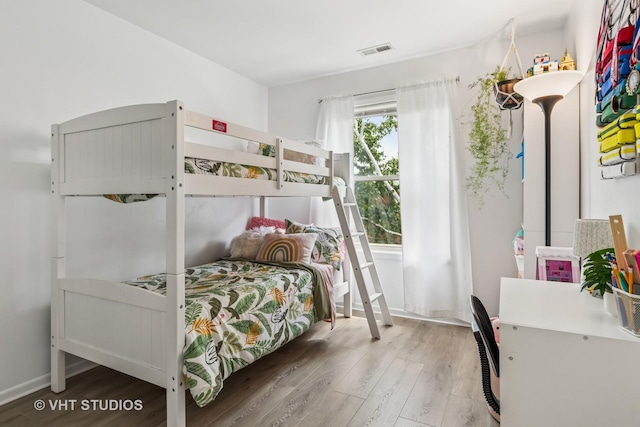 1336 Mcdowell Rd Unit 201, Naperville, IL 60563 - bedroom with wood finished floors and a desk