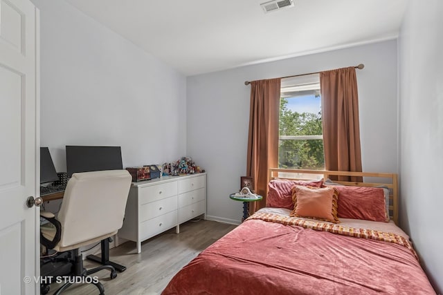 1336 Mcdowell Rd Unit 201, Naperville, IL 60563 - bedroom featuring wood finished floors and an office area