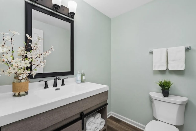 1168 Banbury Cir, Naperville, IL 60540 - half bath featuring vanity and wood finished floors