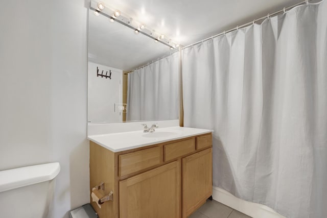 1151 W 14th Pl Unit 238, Chicago, IL 60608 - bathroom featuring vanity, tile patterned flooring, and a shower with curtain