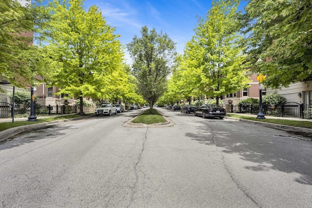 1151 W 14th Pl Unit 238, Chicago, IL 60608 - view of asphalt street with sidewalks and curbs