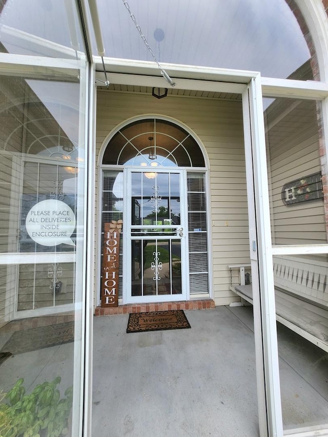 7227 Hawthorne Rdg, Roscoe, IL 61073 - entrance to property with a porch