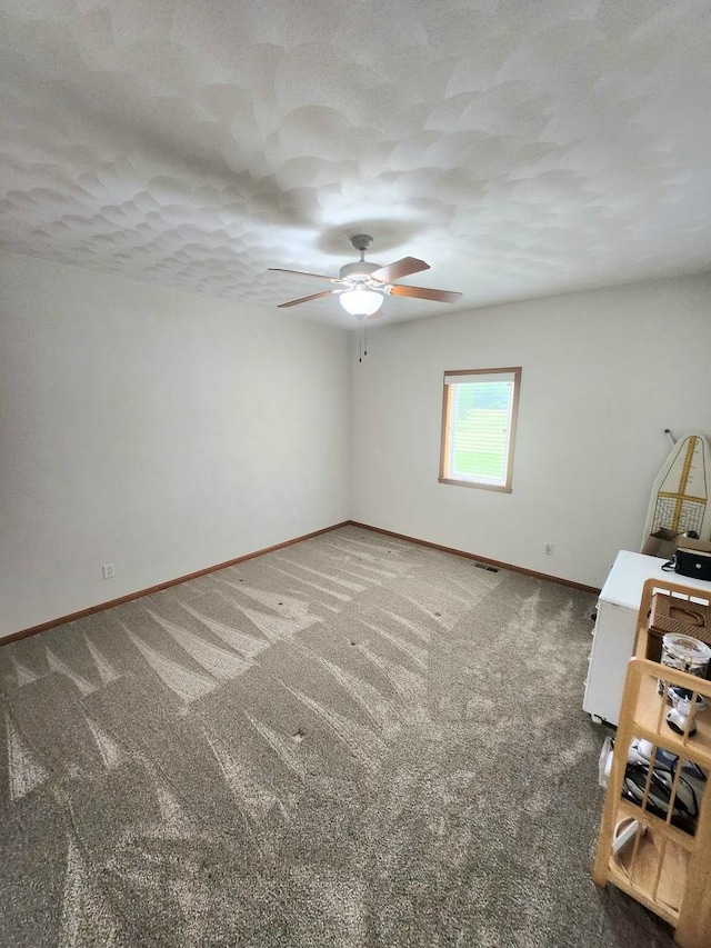 7227 Hawthorne Rdg, Roscoe, IL 61073 - unfurnished room featuring ceiling fan and carpet flooring
