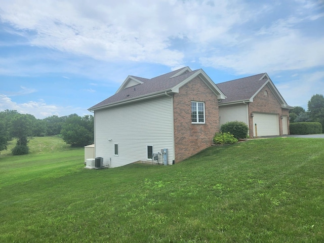 7227 Hawthorne Rdg, Roscoe, IL 61073 - view of property exterior with brick siding, an attached garage, a lawn, concrete driveway, and roof with shingles
