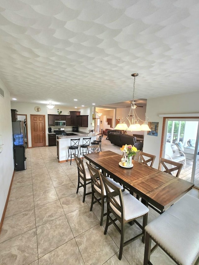 7227 Hawthorne Rdg, Roscoe, IL 61073 - dining room with light tile patterned flooring