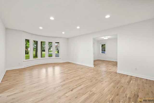 8019 S Malta Rd, Dekalb, IL 60115 - empty room featuring healthy amount of natural light, light wood finished floors, and recessed lighting