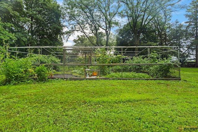 8019 S Malta Rd, Dekalb, IL 60115 - view of home's community featuring a yard and a garden