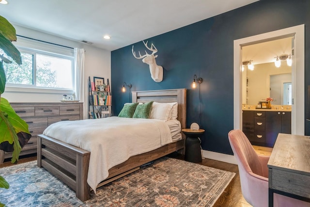 2144 W Schiller St Unit H, Chicago, IL 60622 - bedroom featuring connected bathroom, recessed lighting, and wood finished floors