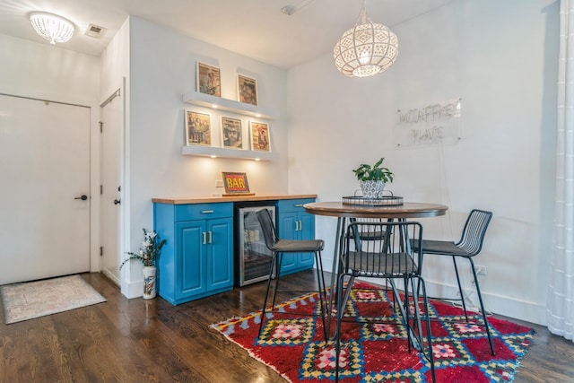 2144 W Schiller St Unit H, Chicago, IL 60622 - dining area with dark wood-type flooring, a dry bar, and beverage cooler