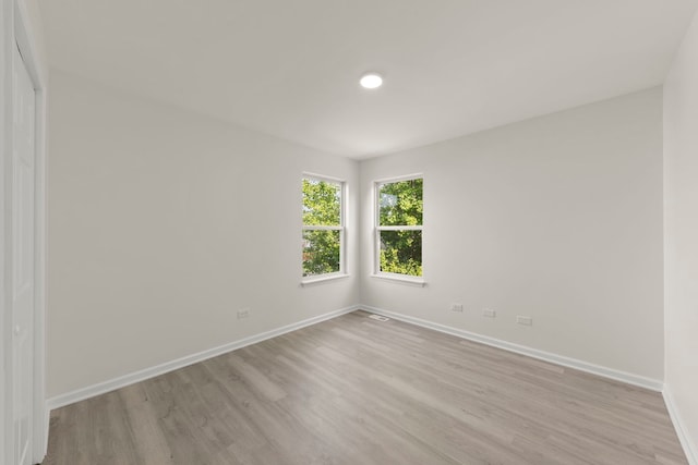 1918 Prairie Ridge Ct, Plainfield, IL 60586 - unfurnished room with light wood finished floors and baseboards