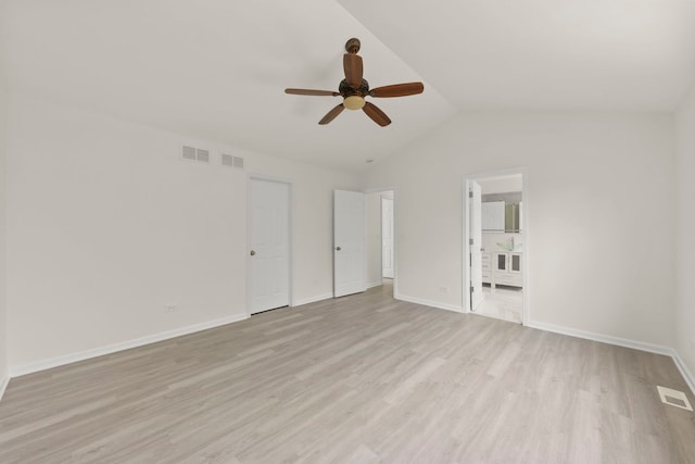 1918 Prairie Ridge Ct, Plainfield, IL 60586 - unfurnished bedroom featuring light wood-type flooring, lofted ceiling, a ceiling fan, and ensuite bath