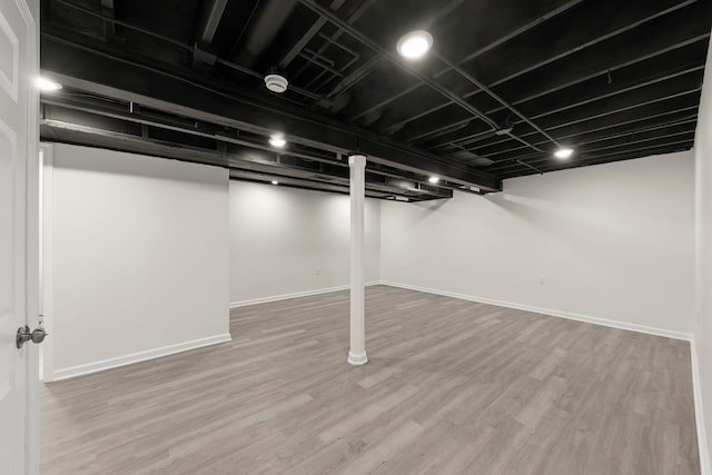 1918 Prairie Ridge Ct, Plainfield, IL 60586 - finished basement featuring wood finished floors and baseboards