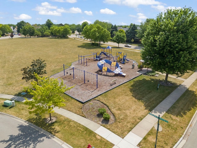 1918 Prairie Ridge Ct, Plainfield, IL 60586 - communal playground with a lawn and view of wooded area
