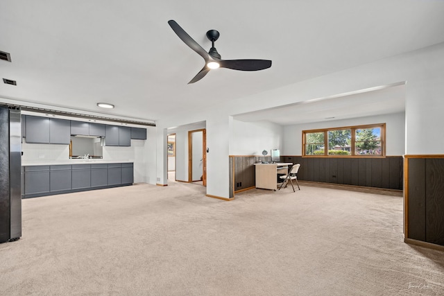 13301 Maverick Trl, Homer Glen, IL 60491 - living room featuring ceiling fan, a wainscoted wall, light carpet, an office area, and wood walls