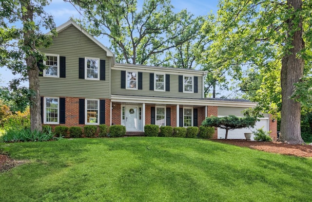 200 Timbercrest Dr, Schaumburg, IL 60193 - view of front of property with brick siding, a front yard, and an attached garage