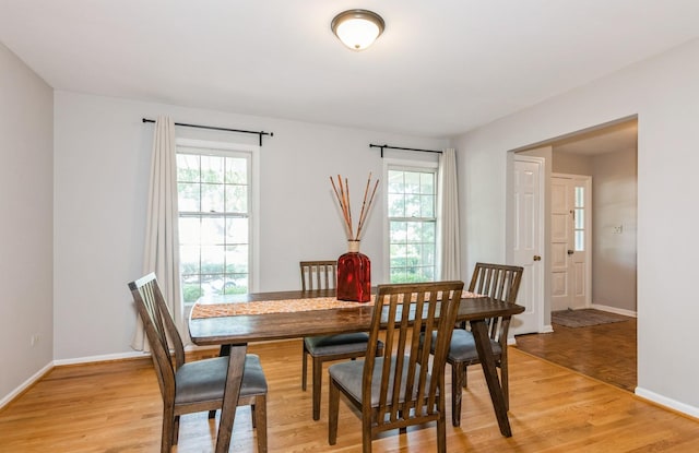 200 Timbercrest Dr, Schaumburg, IL 60193 - dining area featuring light wood-type flooring and healthy amount of natural light