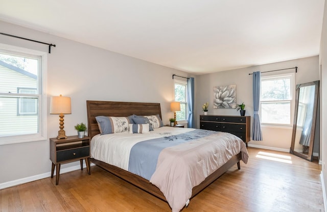 200 Timbercrest Dr, Schaumburg, IL 60193 - bedroom with light wood-style floors and baseboards