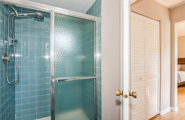 200 Timbercrest Dr, Schaumburg, IL 60193 - ensuite bathroom with a stall shower and wood finished floors