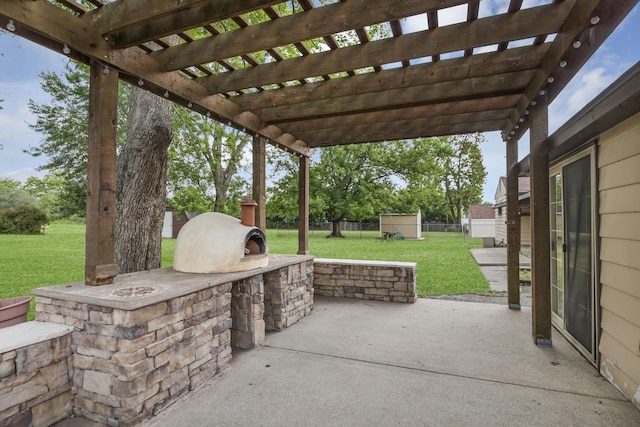 21130 Kildare Ave, Matteson, IL 60443 - view of patio / terrace with a storage unit, a pergola, and an outdoor kitchen